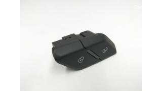 Button for blocking the central locking door of the front left Audi E-