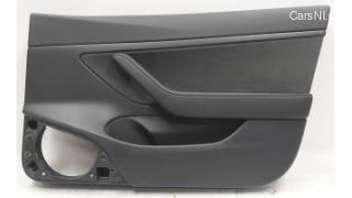 1 Front right door card partially assembled with power window adjustme